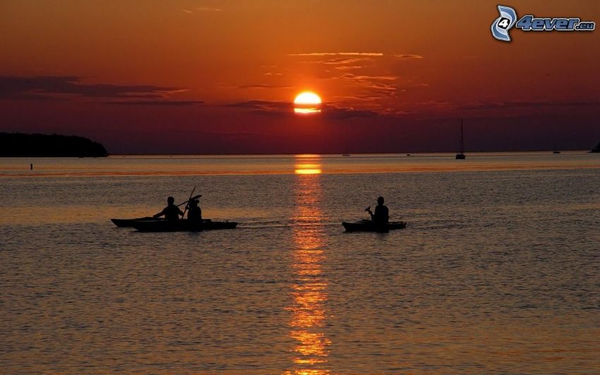 Boote, Sonnenuntergang über dem Meer