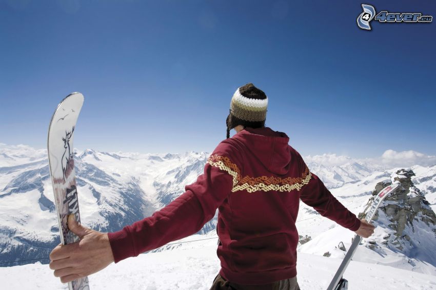 Skifahrer, schneebedeckte Berge, Aussicht