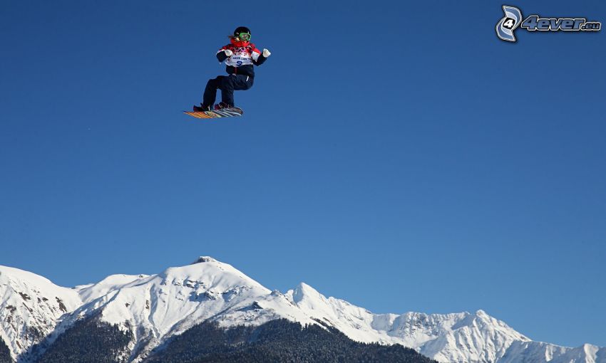 snowboarding, Sprung, schneebedeckte Berge