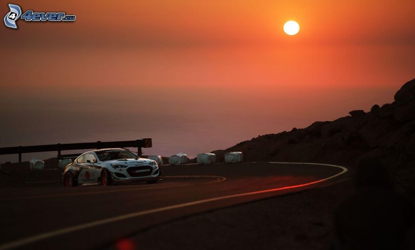 Hyundai, racerbil, kurva, solnedgång över hav