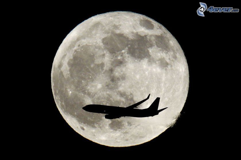Månen, silhuett av flygplan, fullmåne