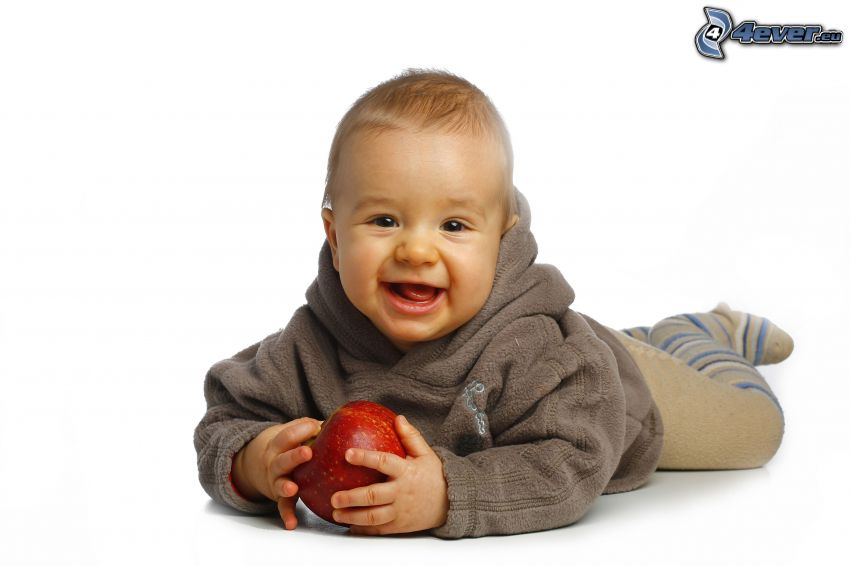 liten pojke, rött äpple, leende