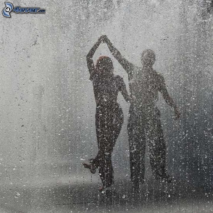 dans i regn, silhuett av ett par, svartvitt foto