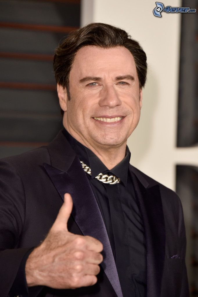 John Travolta, leende, tummen upp
