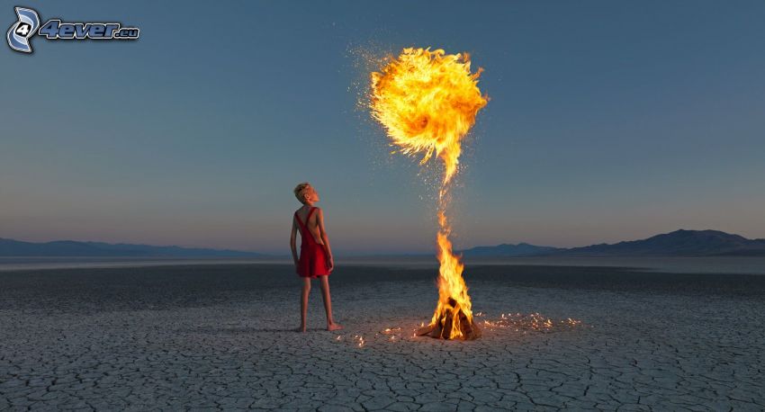 kvinna med eld, flamma, uttorkat landskap