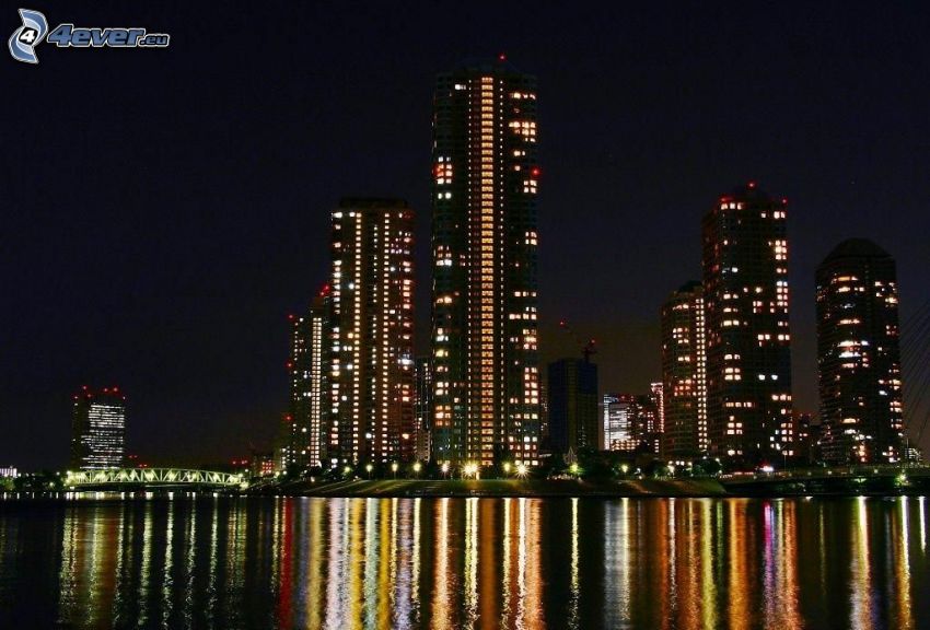 ciudad de noche, río, rascacielos