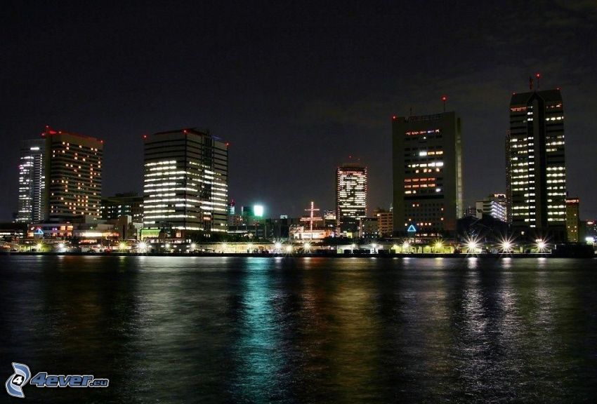 ciudad de noche, río
