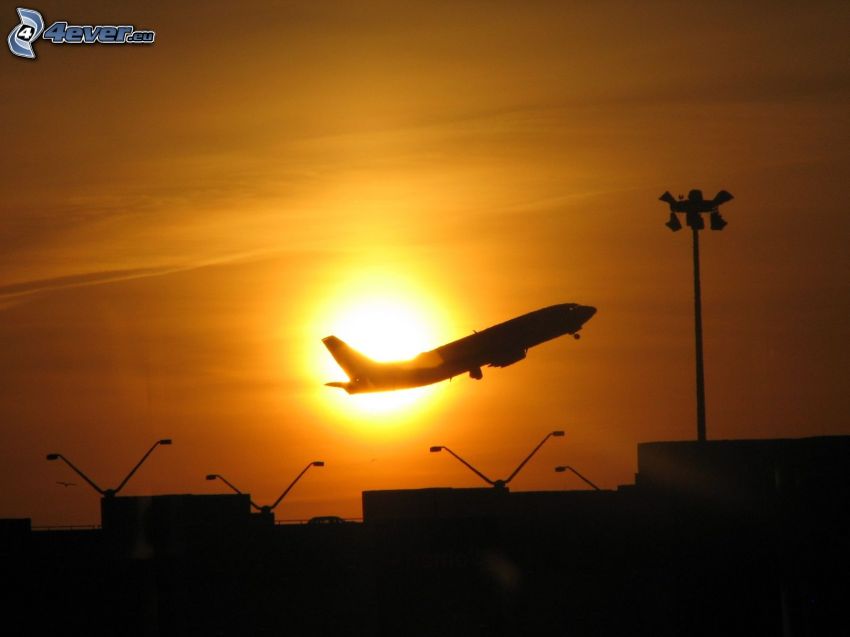 décollage au coucher du soleil, avion, aéroport