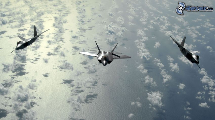 F-22 Raptor escadrille, mer, nuages