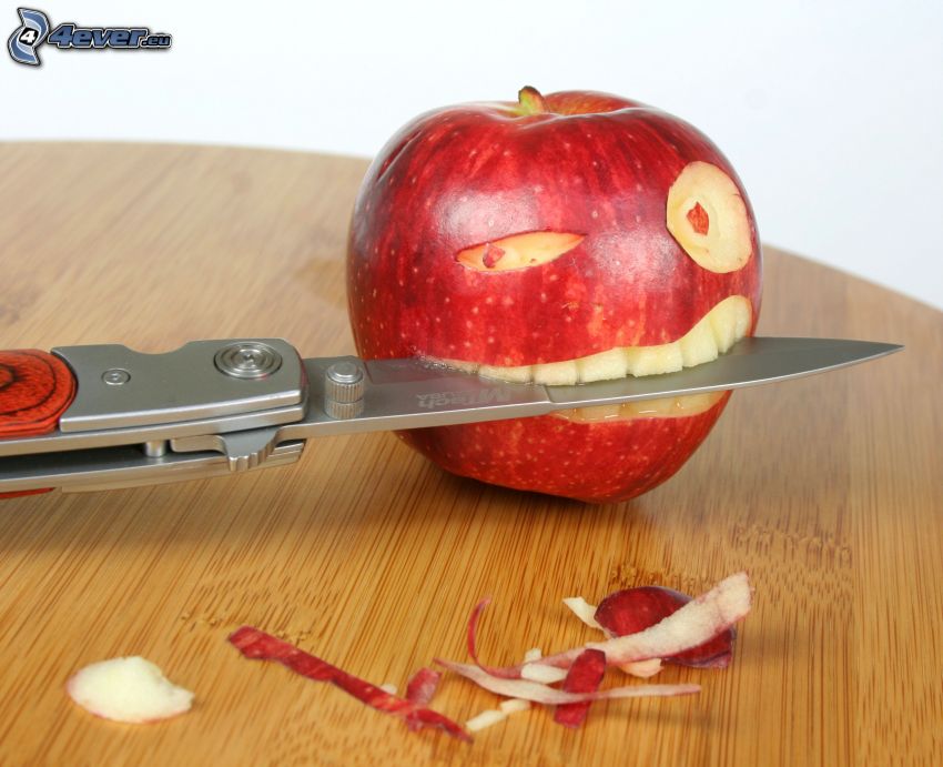 pomme rouge, couteau, sourire
