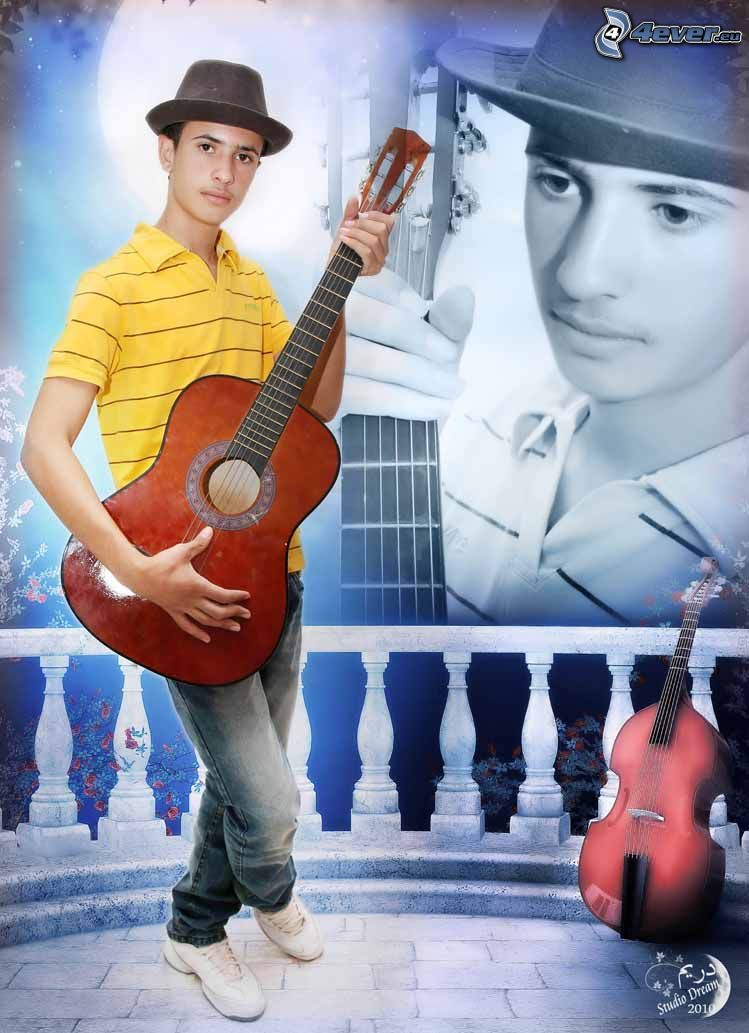 le garçon avec une guitare