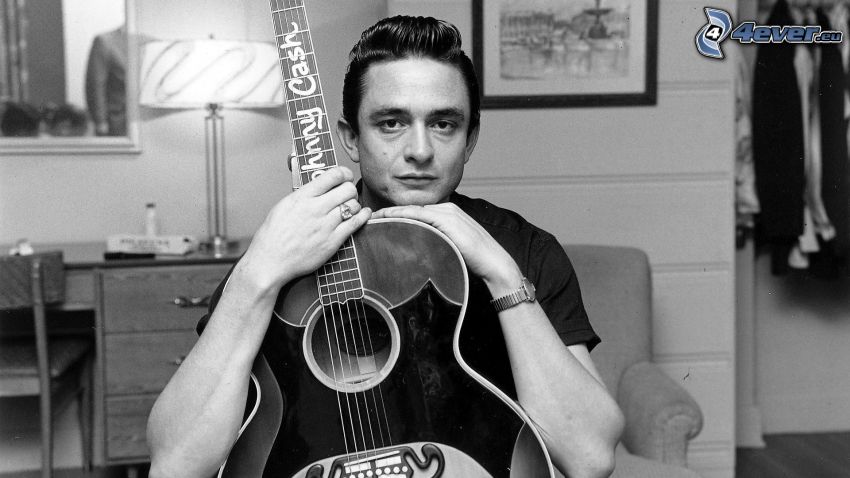 Johnny Cash, homme avec la guitare, quand elle est jeune, photo noir et blanc