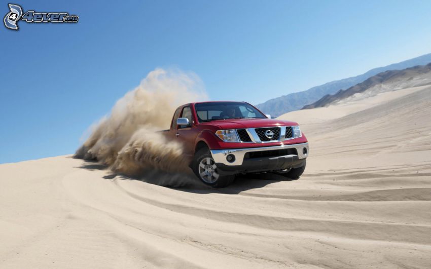 Nissan Frontier, sable, la poussière