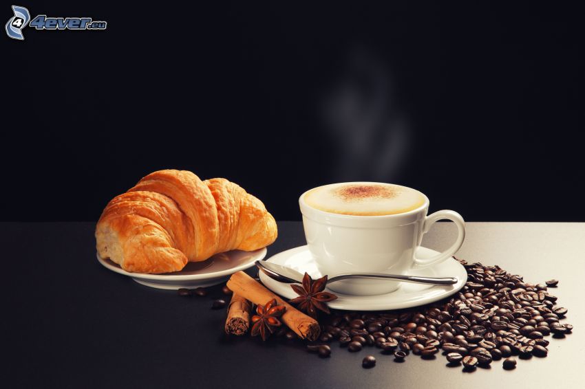 colazione, una tazza di caffè, croissant, chicchi di caffè, cannella
