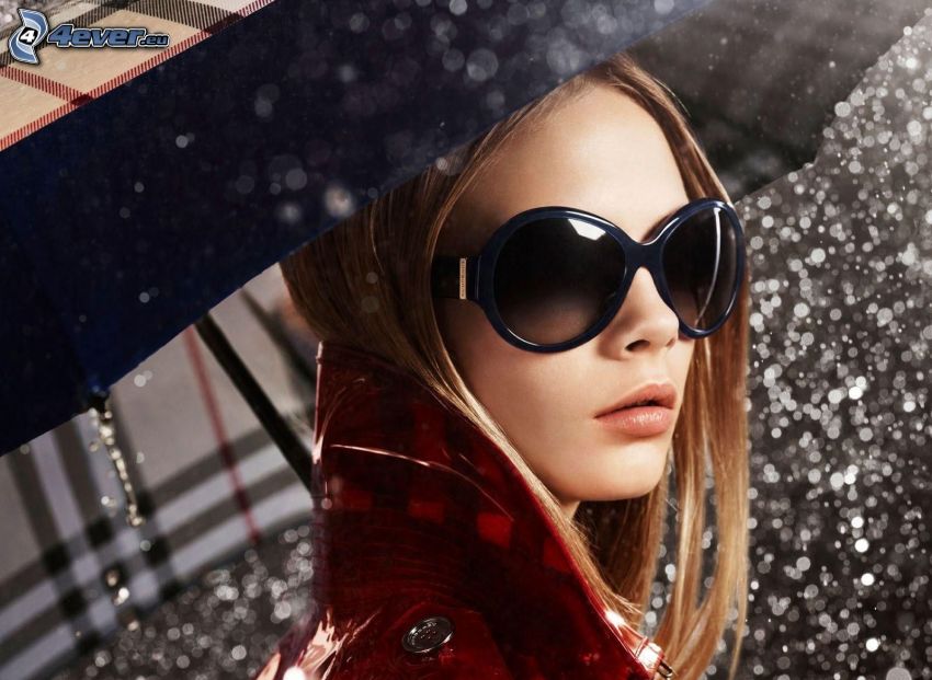 Cara Delevingne, modella, occhiali da sole, ombrello, gocce di pioggia