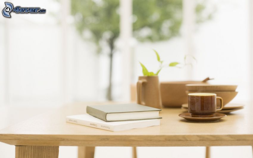 könyv, csésze kávé, asztal