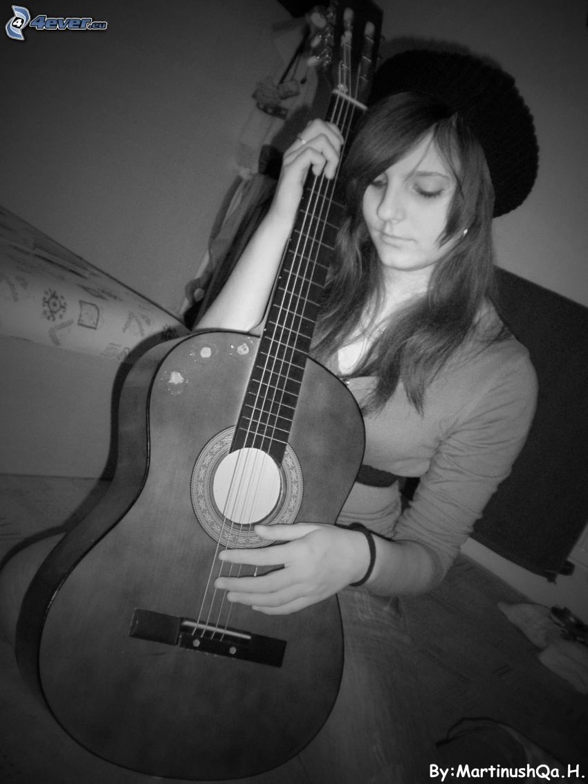 lány gitárral