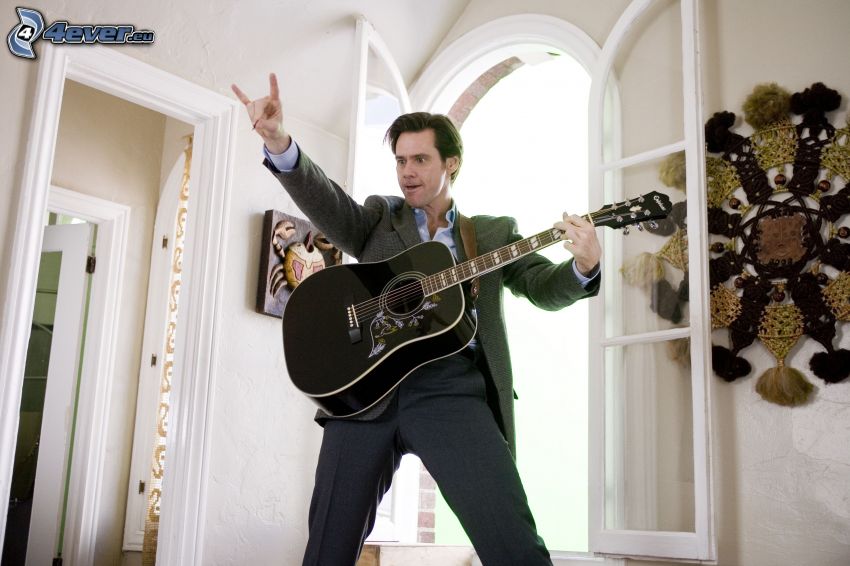Jim Carrey, férfi gitárral