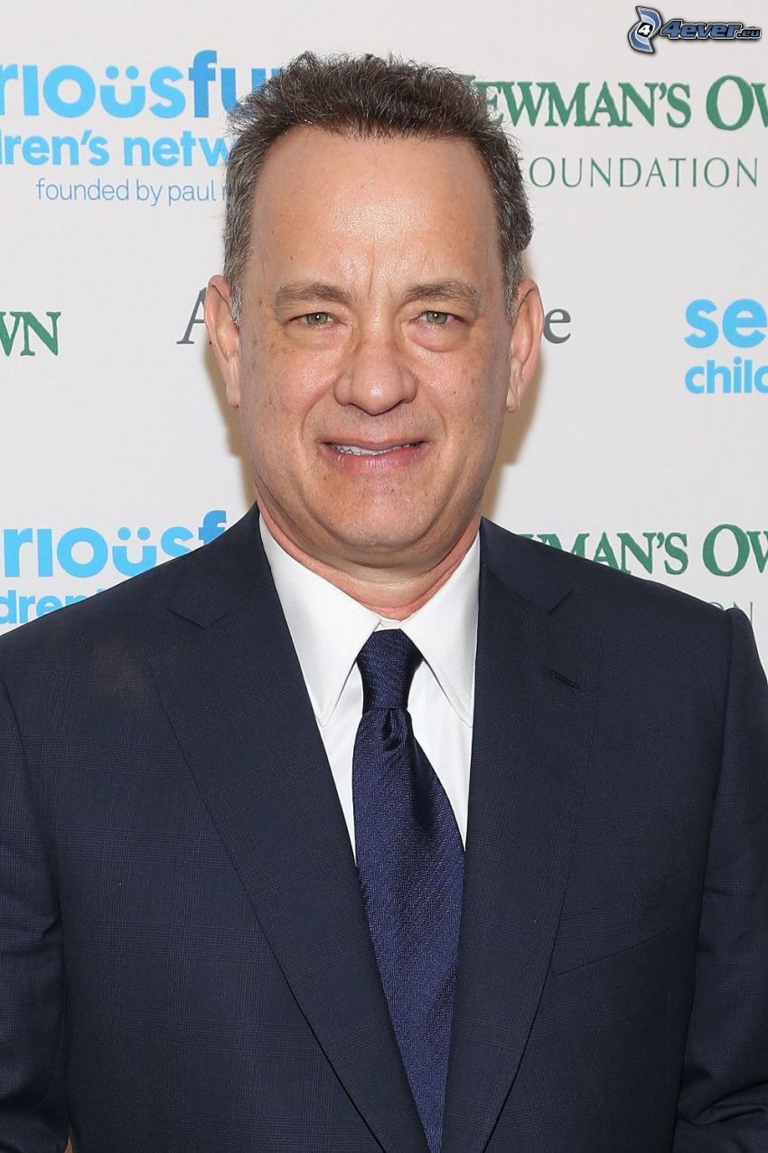 Tom Hanks, férfi öltönyben, mosoly