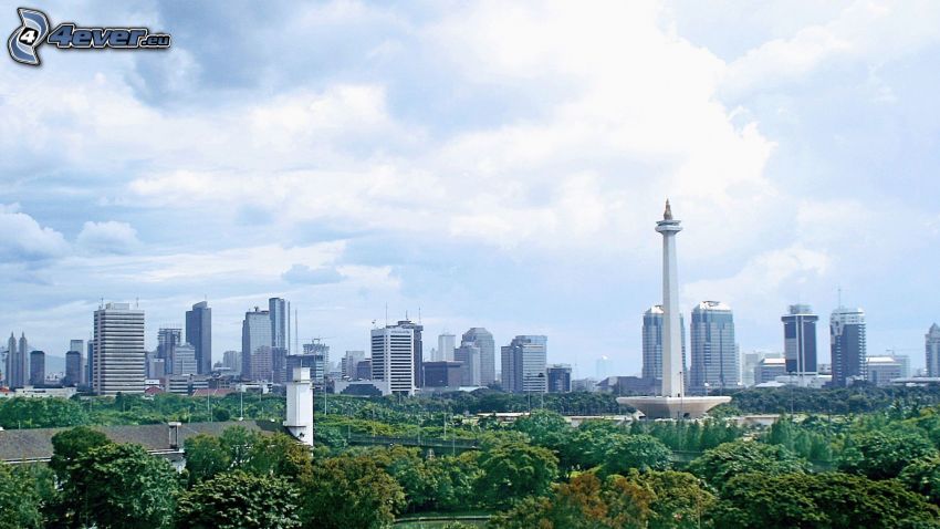Jakarta, felhőkarcolók, fák