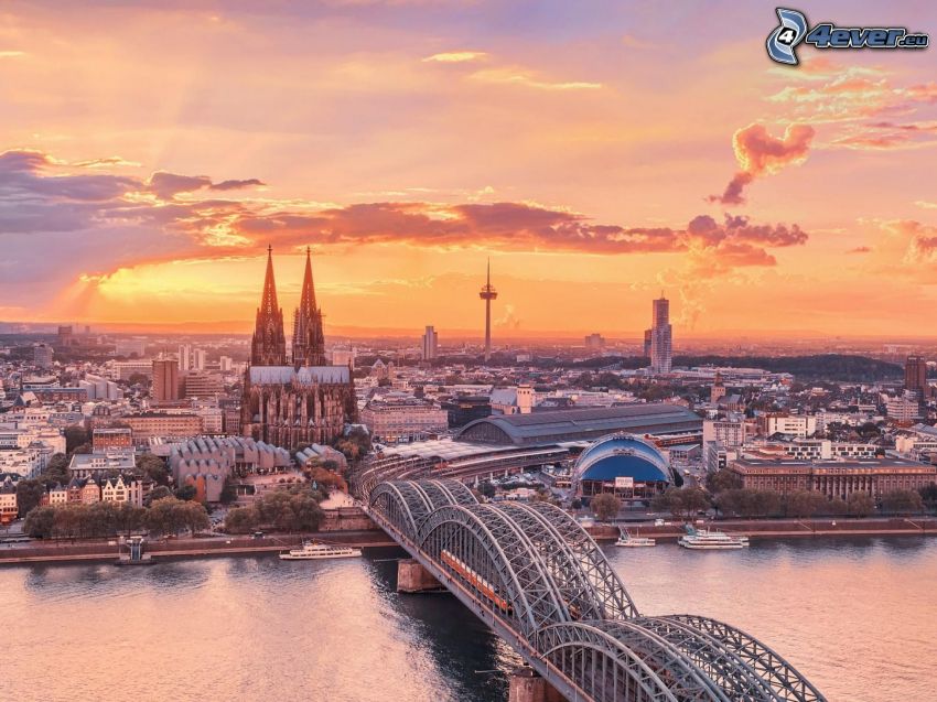 Köln, Kölni dóm, vasúti híd, esti város, narancssárga naplemente