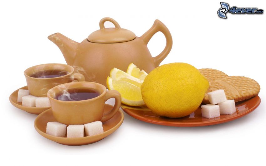 teáskanna, csészék, kockacukor, citrom, aprósütemény
