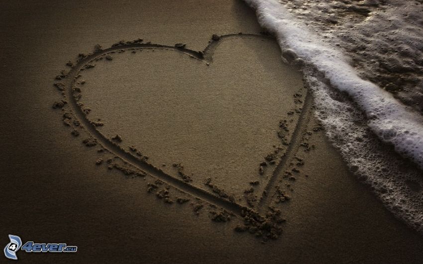 szív a homokban