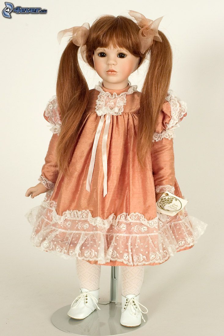 porcelanowa lalka, pomarańczowa sukienka