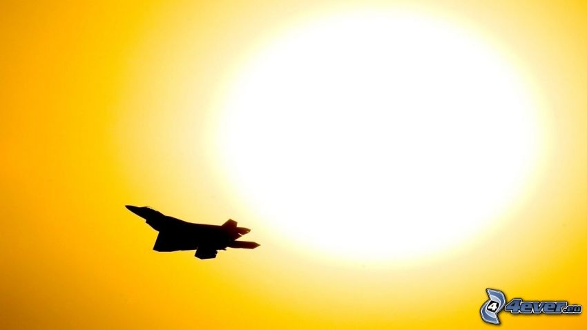 F-22 Raptor, silueta stíhačky, slnko