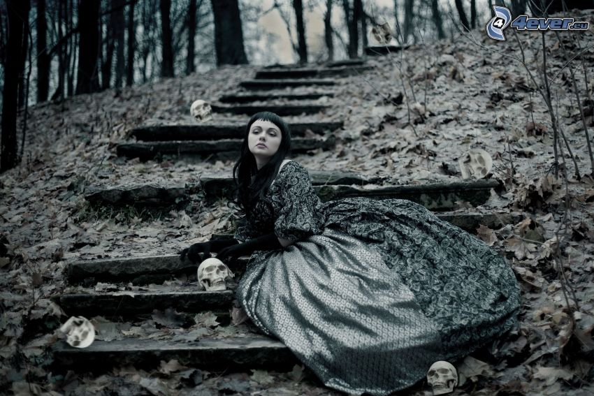 gotické dievča, schody, suchý list, lebky