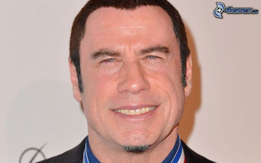 John Travolta, úsmev