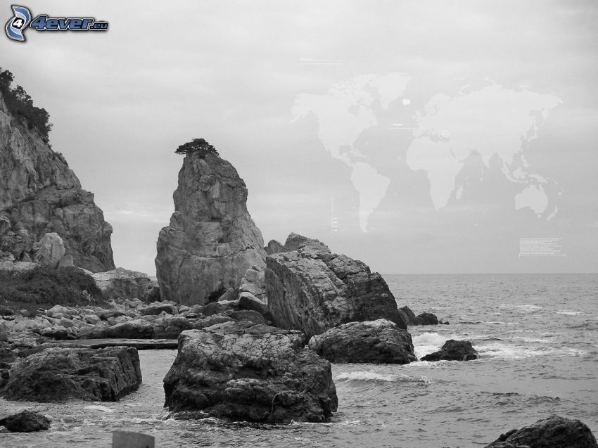 skalnaté pobrežie, mapa sveta, čiernobiela fotka