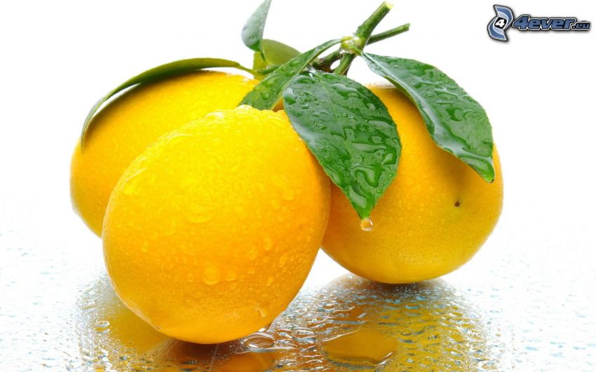 citróny, kvapky vody