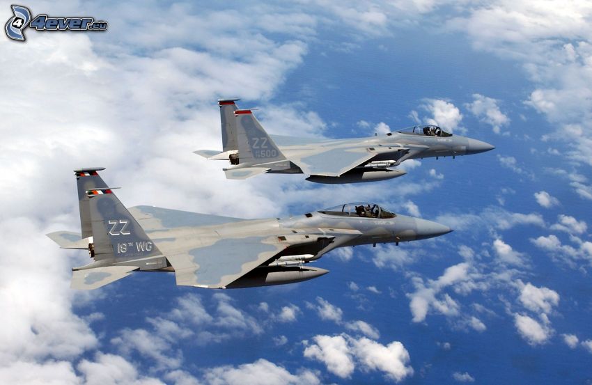 Fleet of F-15 Eagle, fighters, sea, clouds