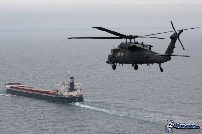 military helicopter, freighter, sea