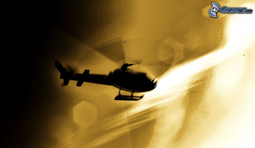 silhouette of helicopter
