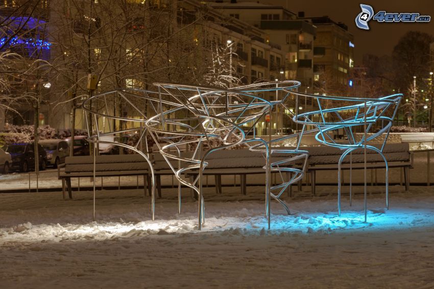 jungle gym, night city, snow-covered benches