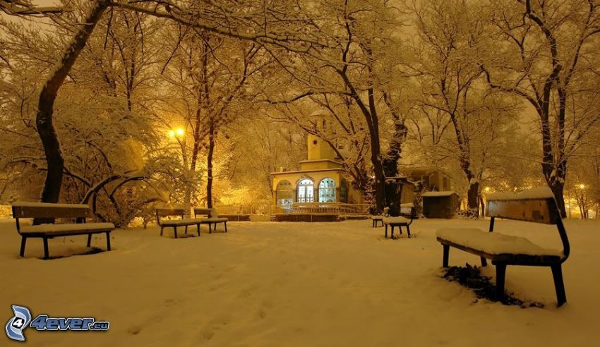 snowy park, snow-covered benches, snow-covered chapel