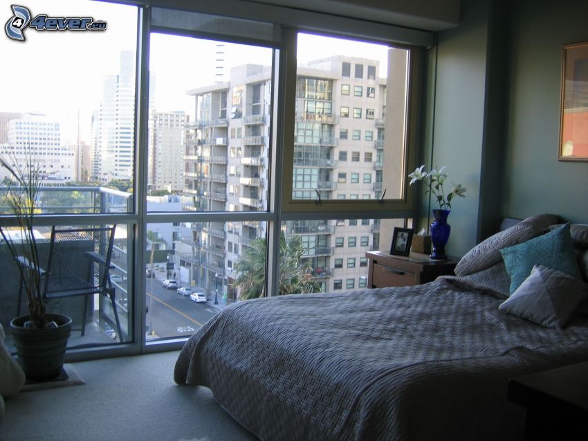bedroom, double bed, view of the city