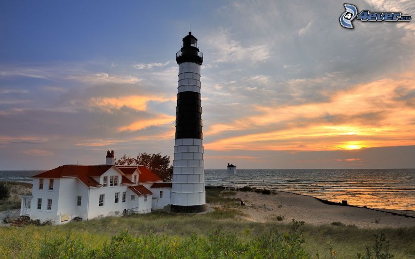 lighthouse, sunset behind the sea, house, coast