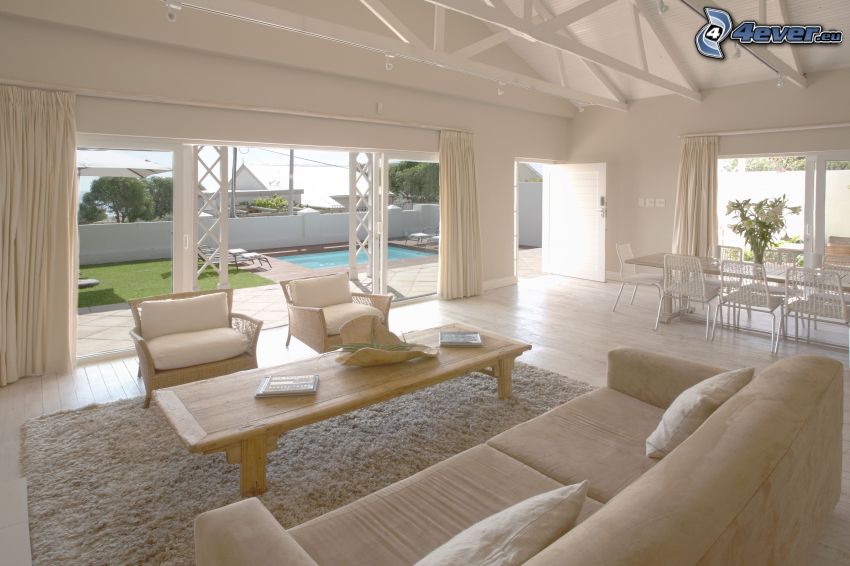 luxurious living room, sofa, chairs, pool