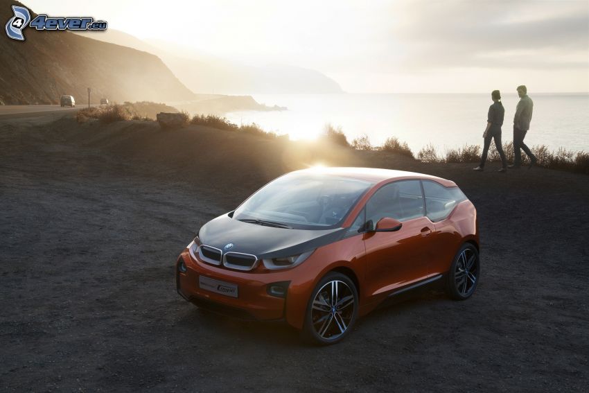 BMW i3 Concept, sunset over the beach, couple