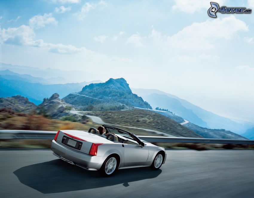 Cadillac XLR, convertible, speed, view of the landscape, hill