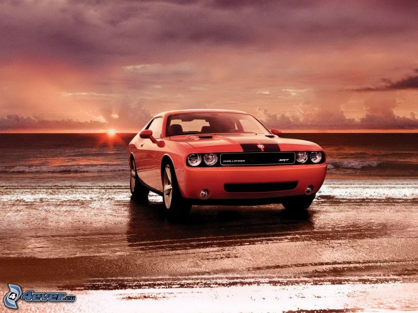 Dodge Challenger, sunset behind the sea
