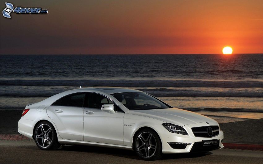 Mercedes CLS 63 AMG, sunset behind the sea