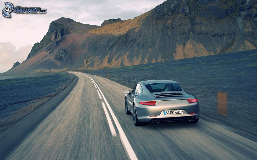 Porsche 911, speed, rocky hills
