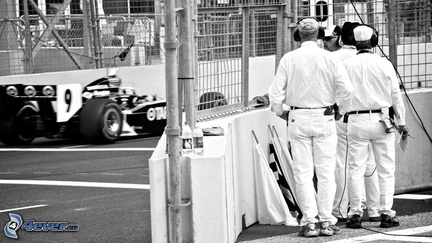 Formula One, men, black and white