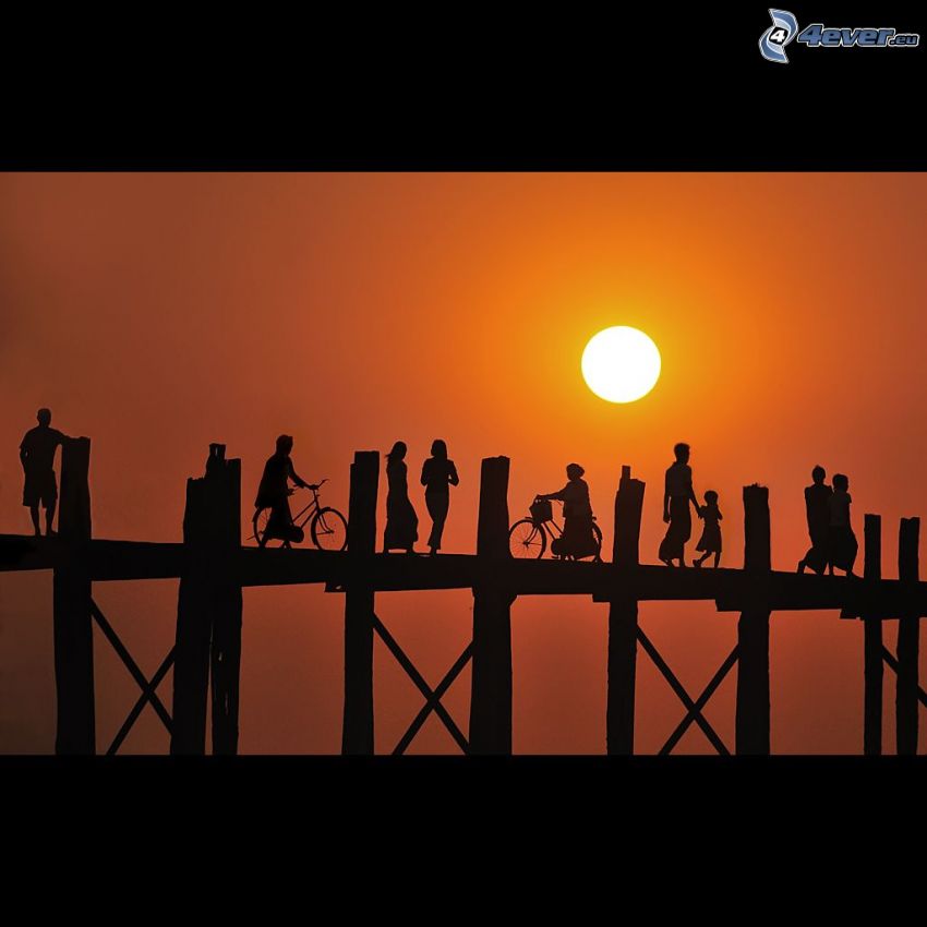 wooden pier, silhouettes of people, sun, orange sky