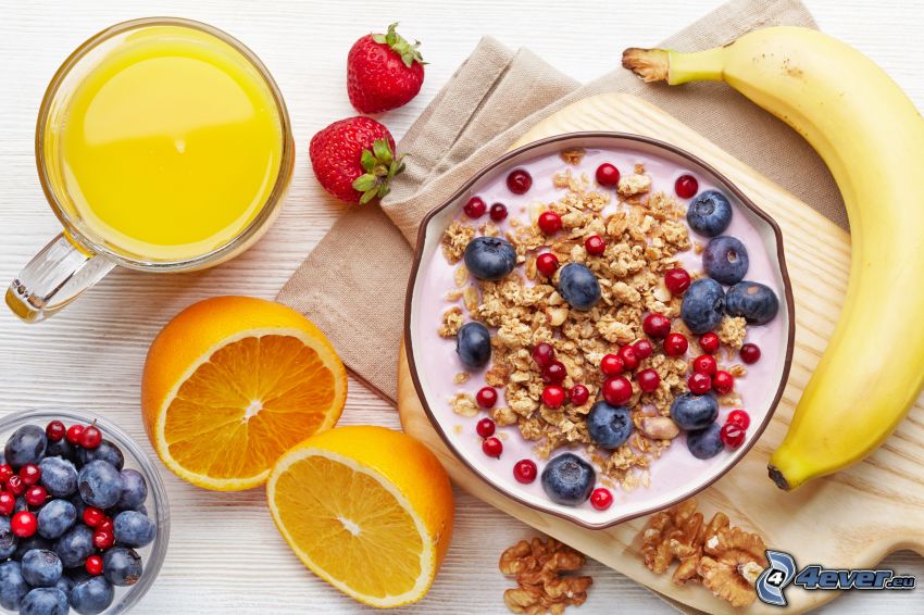breakfast, muesli, yogurt, blueberries, banana, strawberries, walnuts, orange juice