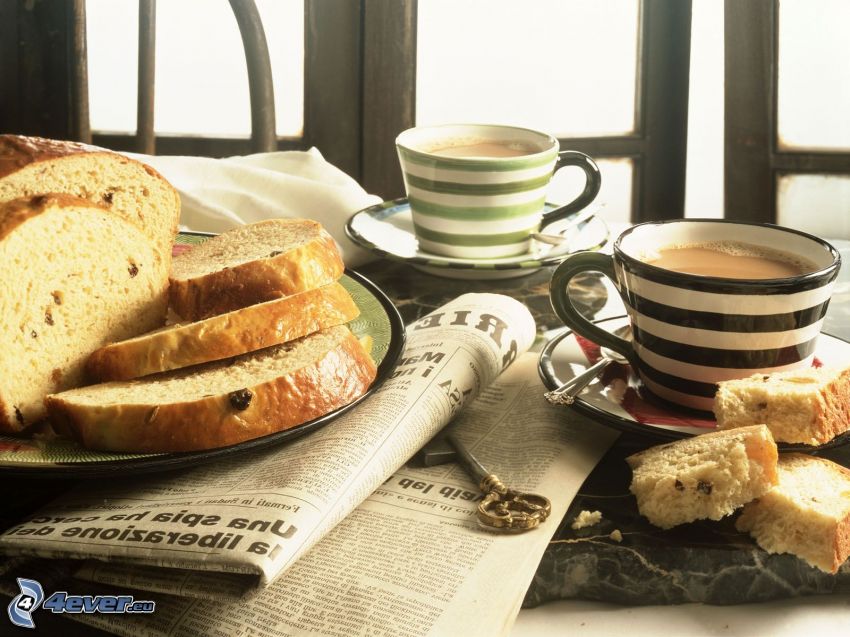 cup of coffee, bread, newspapers